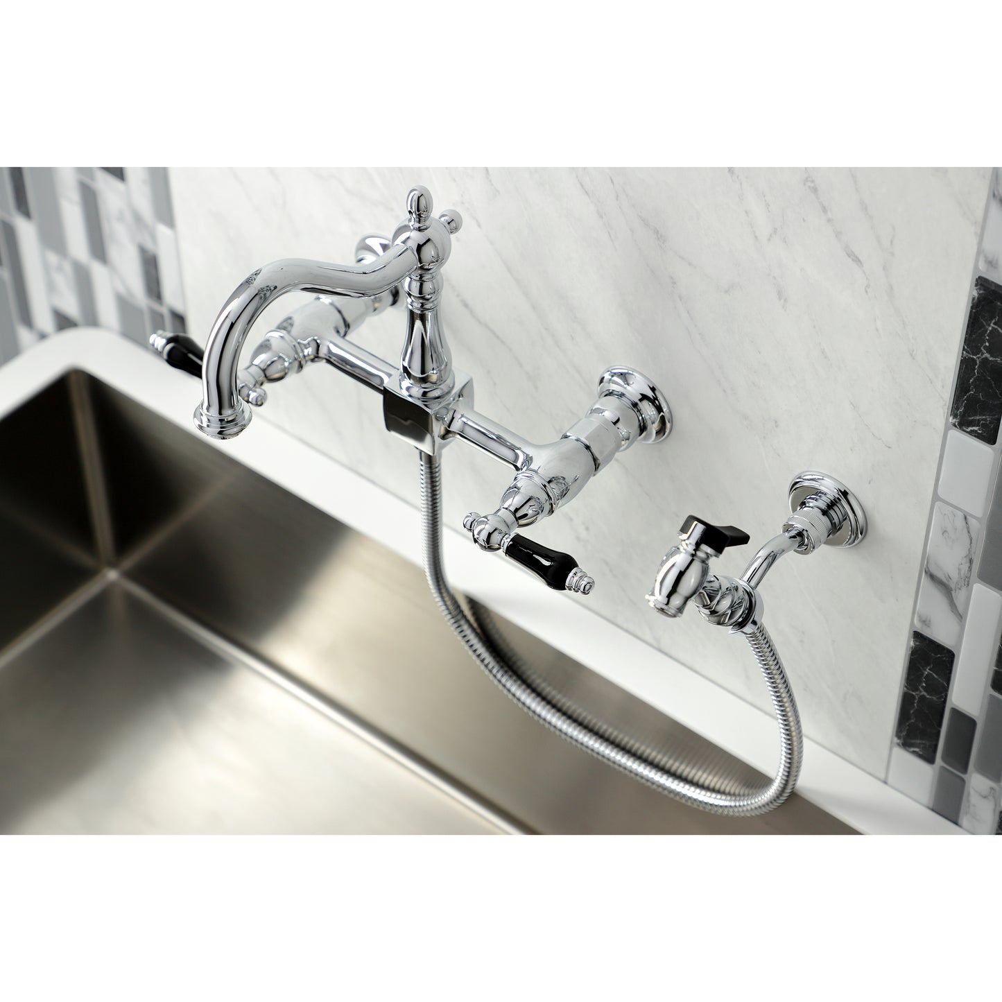 Kingston KS1263PKLBS Duchess Two-Handle Wall Mount Bridge Kitchen Faucet with Brass Sprayer, Antique Brass on a sink