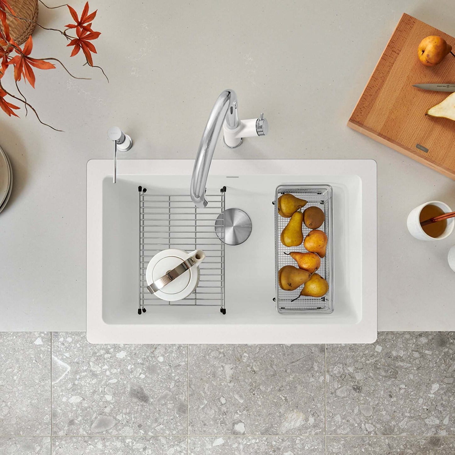 BLANCO VINTERA 30" SILGRANIT Single Bowl Farmhouse Sink with a modern faucet and fruit basket.