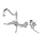 Kingston KS1248TALBS Tudor Two-Handle Wall Mount Bridge Kitchen Faucet with Brass Sprayer, Brushed Nickel in polished chrome finish.