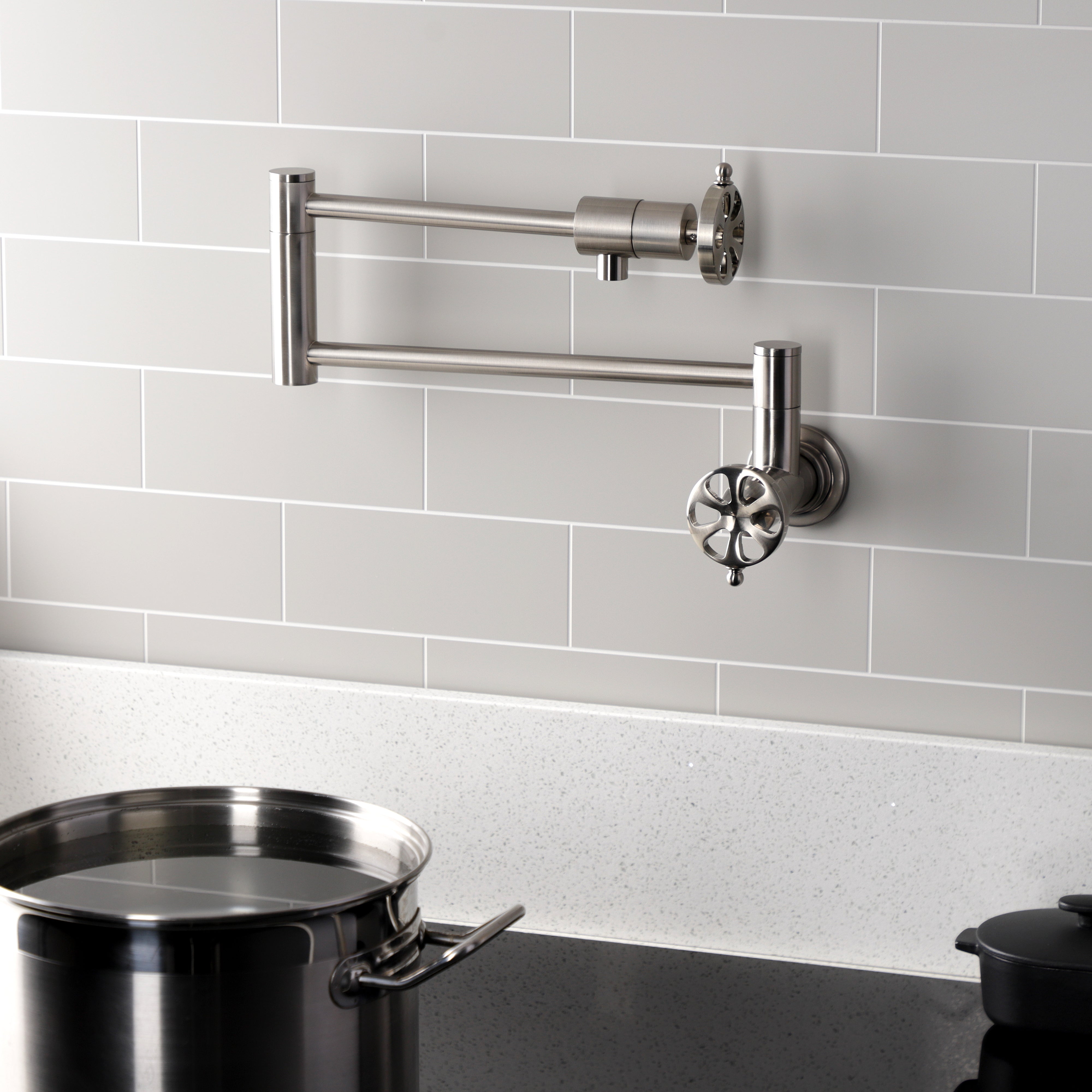 Kingston Brass KS4103RX Belknap Wall Mount Pot Filler Faucet, Antique Brass with foldable swing arms.
