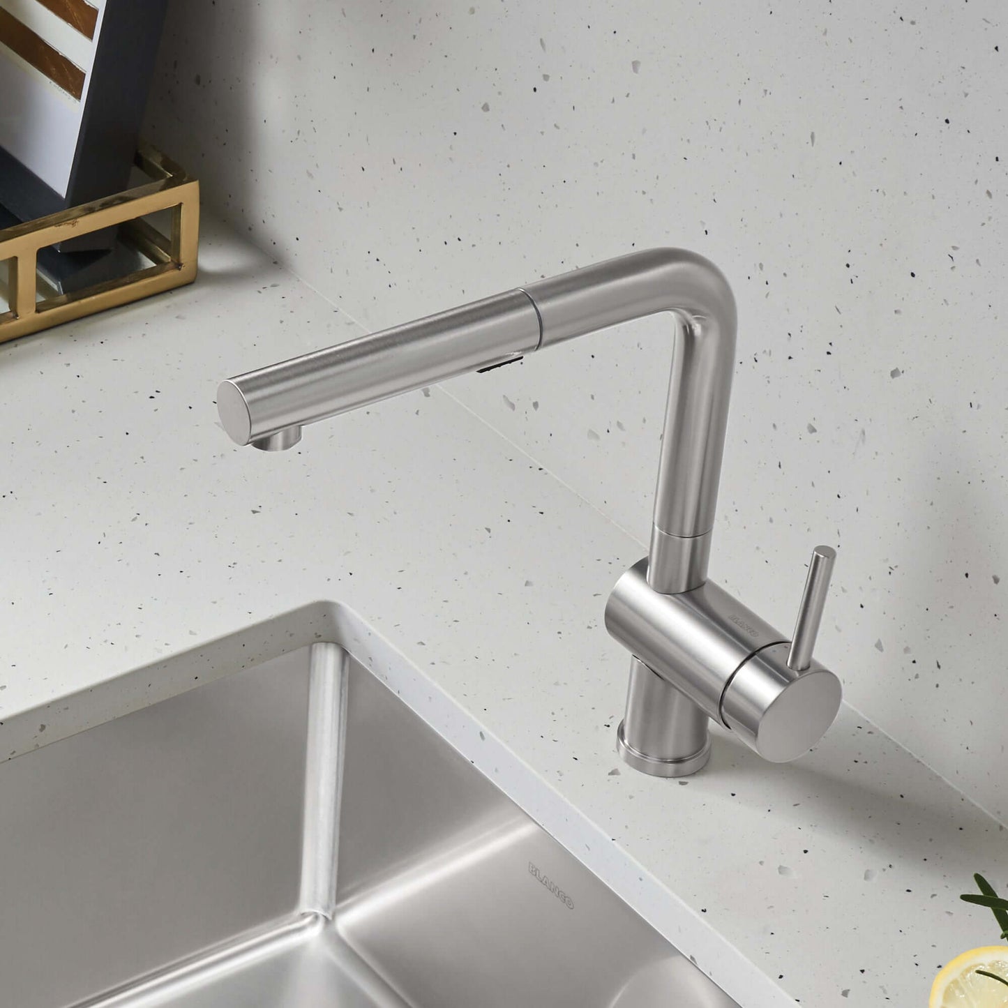 BLANCO Linus Low Arc Pull-Out Dual-Spray Kitchen Faucet - installed in modern kitchen with grey countertop