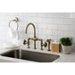 Kingston KS2333RX Belknap Industrial Style Bridge Kitchen Faucet with Brass Sprayer, Antique Brass in a modern kitchen setting.