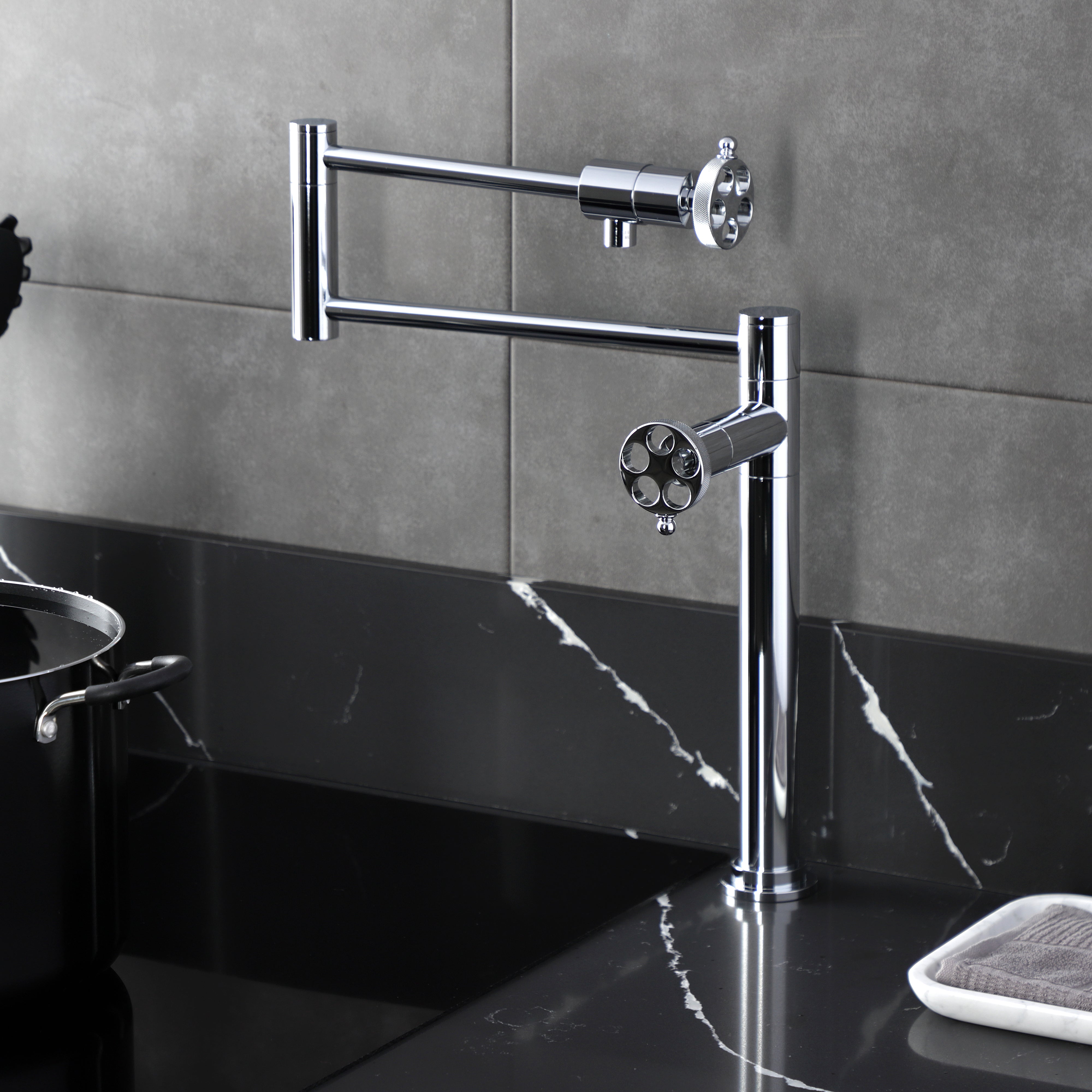 Kingston Brass KS4703RKZ Wendell Deck Mount Pot Filler Faucet with Knurled Handle, Antique Brass installed in a modern kitchen.