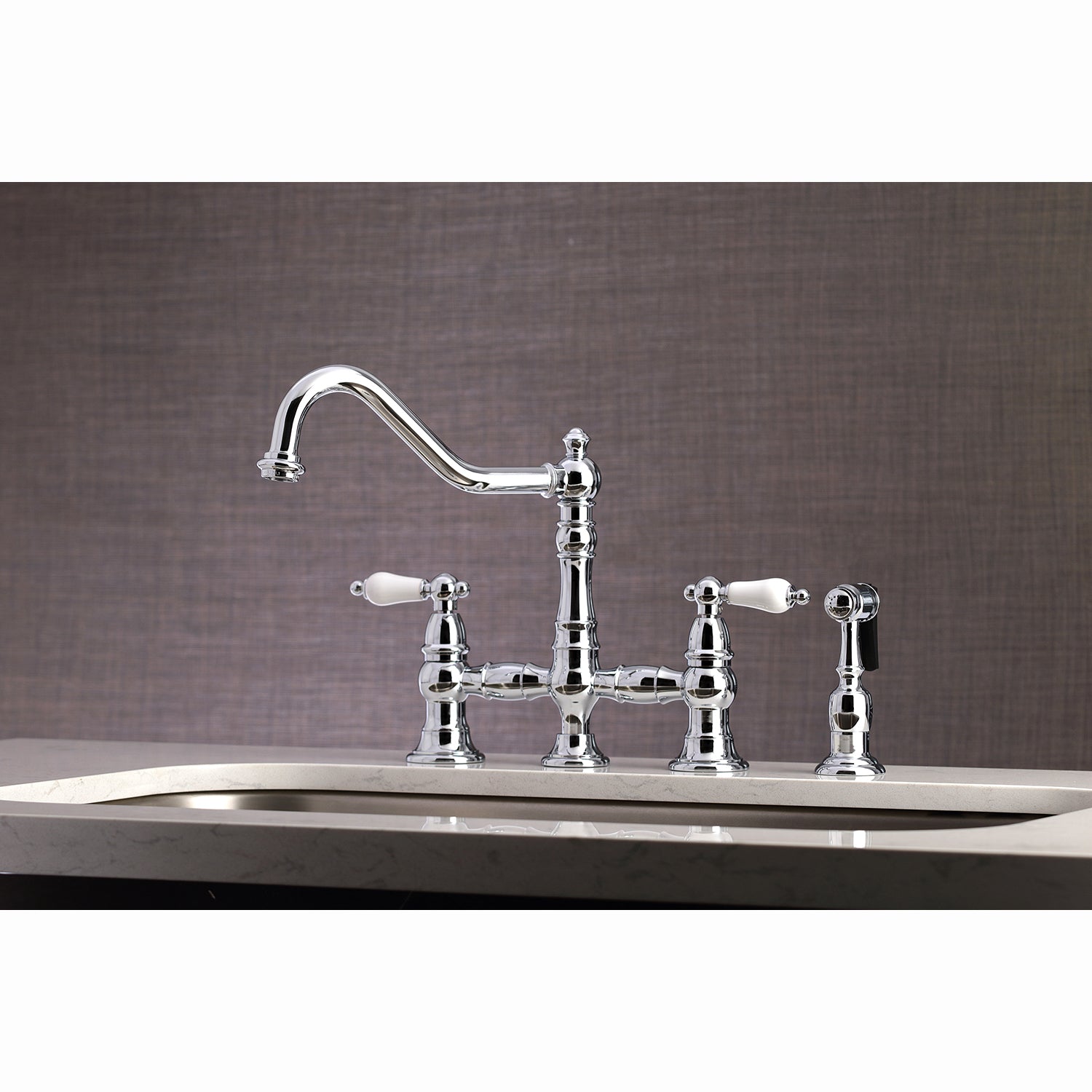 Kingston KS3277PLBS Restoration Bridge Kitchen Faucet with Brass Sprayer, Brushed Brass in chrome finish.