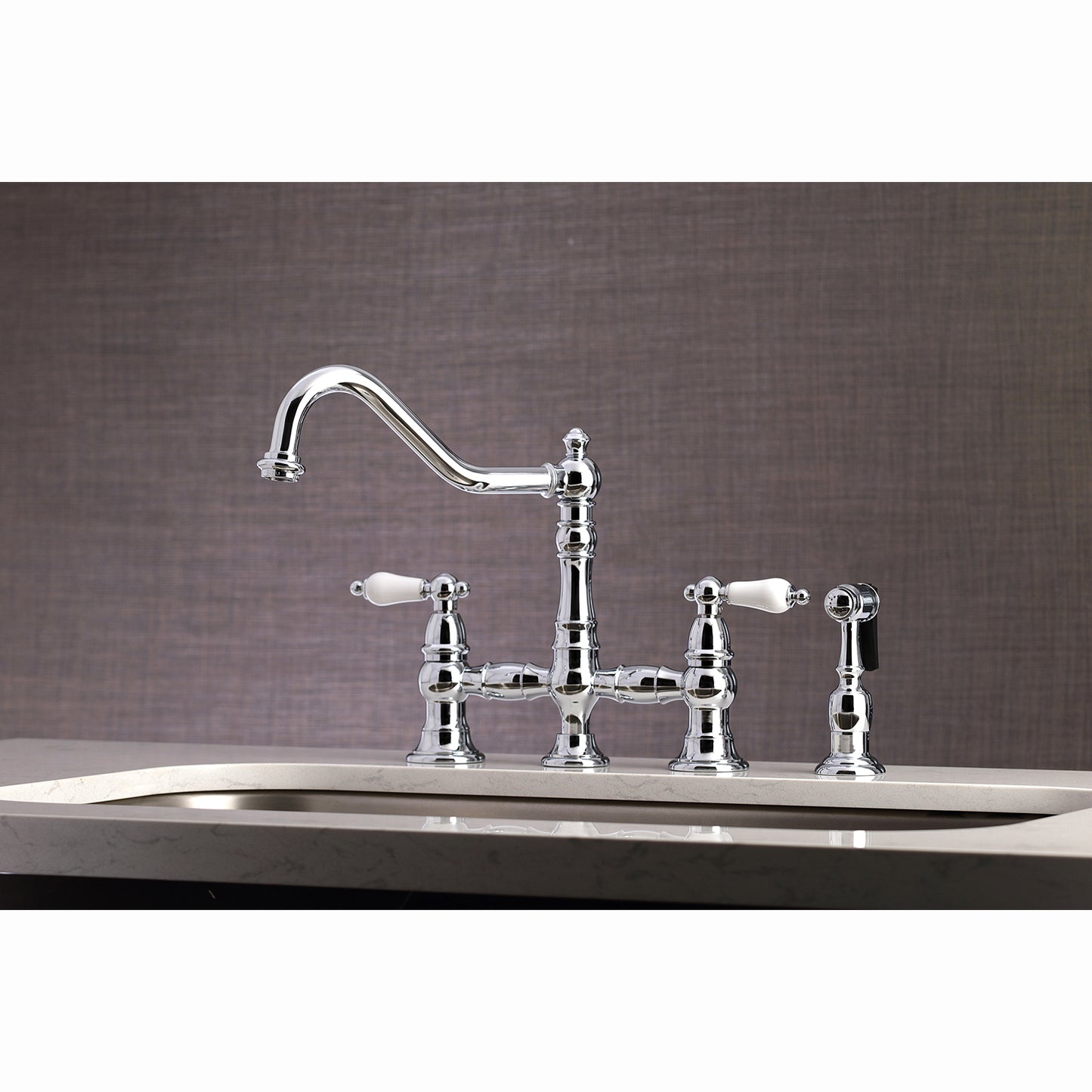 Kingston KS3277PLBS Restoration Bridge Kitchen Faucet with Brass Sprayer, Brushed Brass in chrome finish.