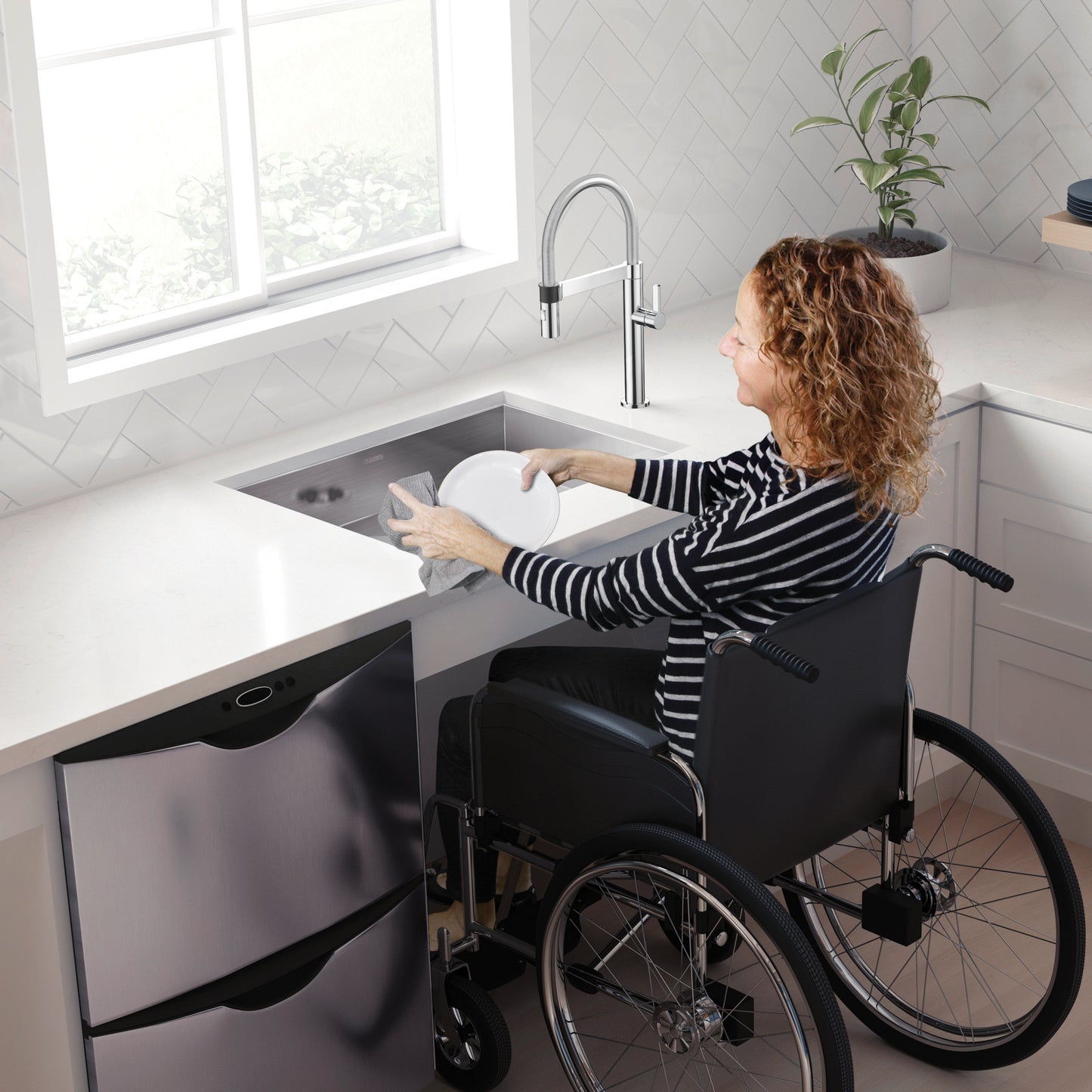 Woman in a wheelchair using a BLANCO Quatrus R0 25" Single Bowl Undermount ADA Stainless Steel Kitchen Sink.