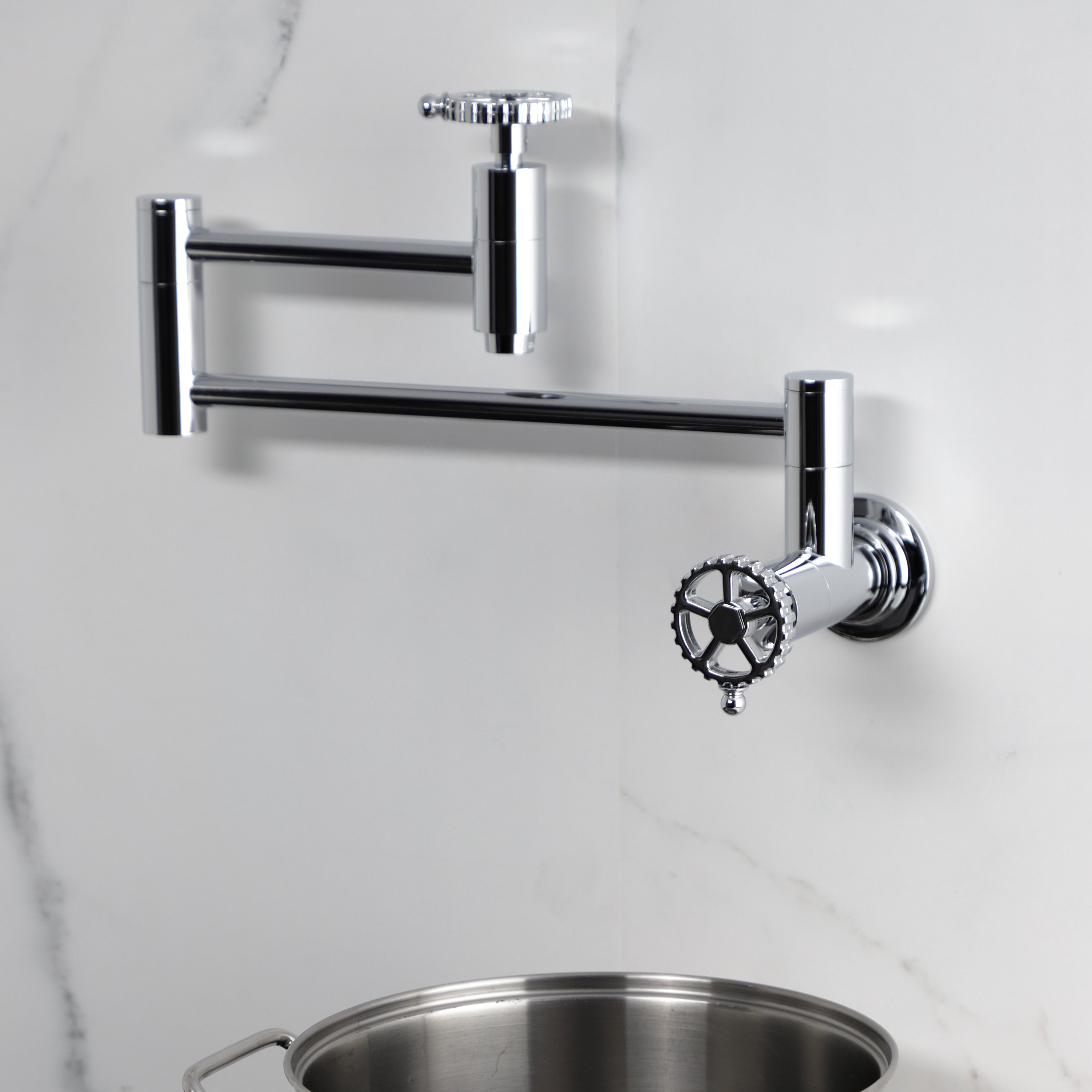 Kingston Brass KS8103CG Fuller Wall Mount Pot Filler Faucet, Antique Brass, featuring foldable swing arms for easy pot filling.