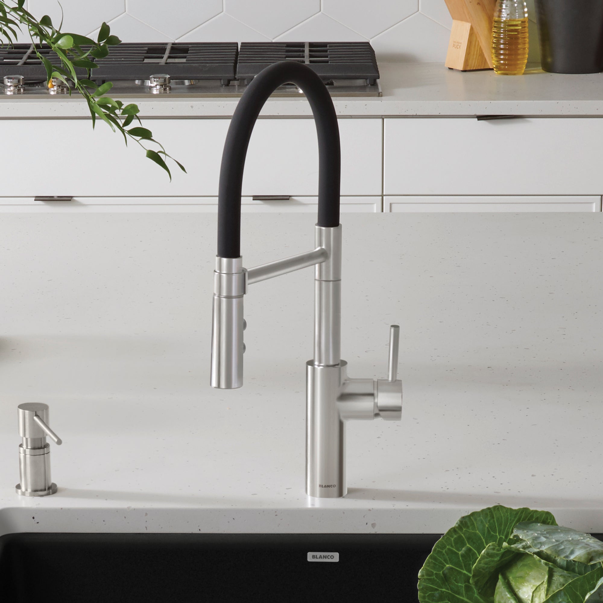 BLANCO Catris Flexo Semi-Pro Pull-Down Dual-Spray Kitchen Faucet in modern kitchen setting with black hose