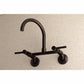 Kingston Brass KS814SB Concord Wall Mount Bridge Kitchen Faucet in a modern gooseneck design against a textured background.