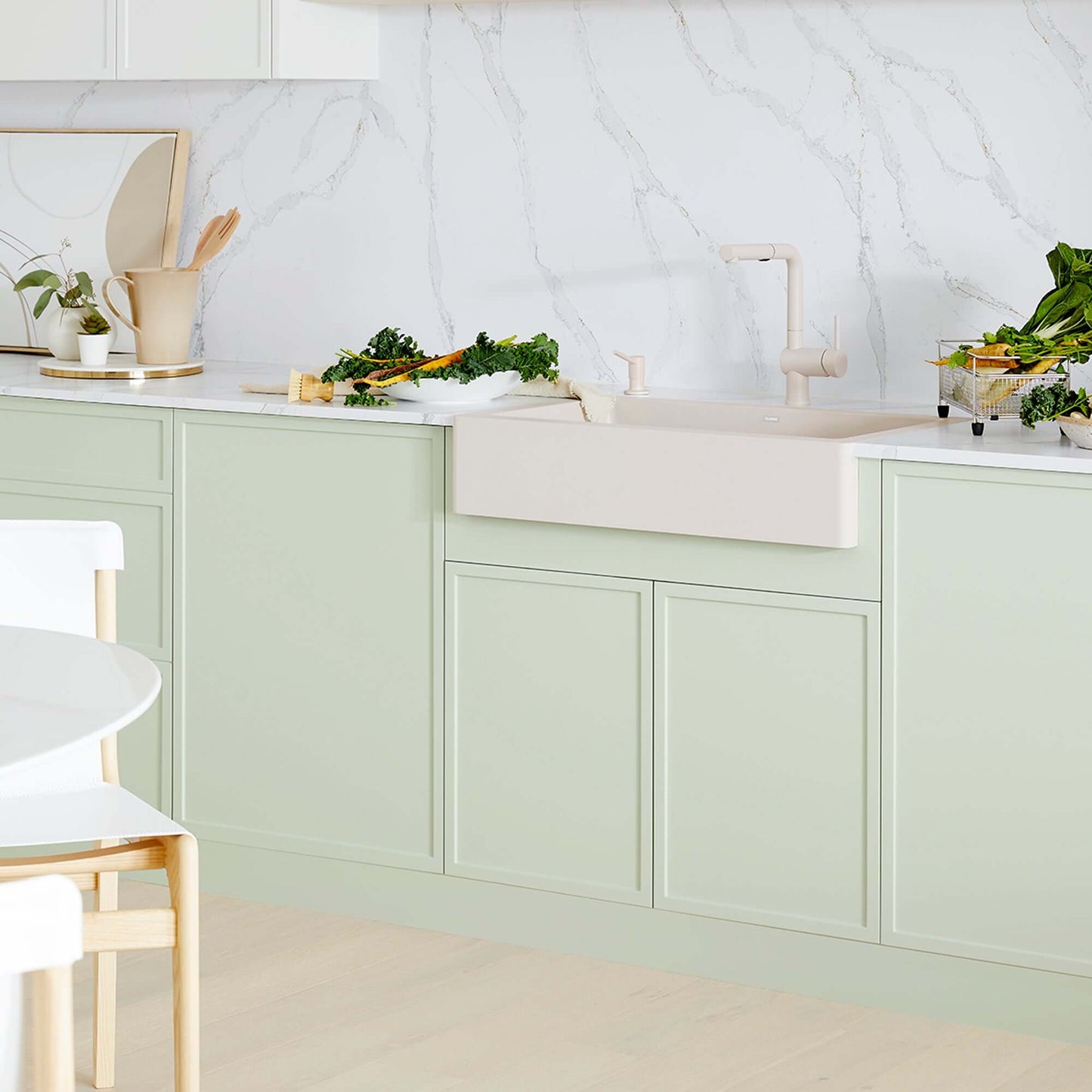BLANCO VINTERA 30" SILGRANIT Single Bowl Farmhouse Sink in a modern kitchen with decorative items and fresh greens.