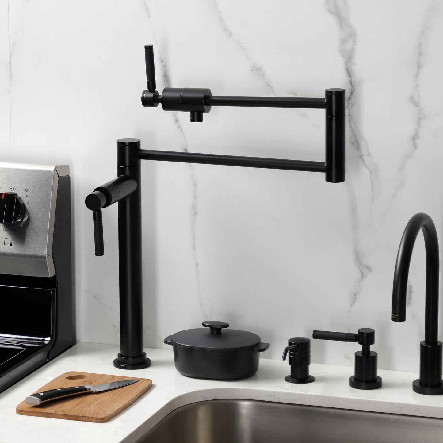 Kingston Brass KS4703DKL Kaiser Deck Mount Pot Filler Faucet, Antique Brass in a modern kitchen setting.