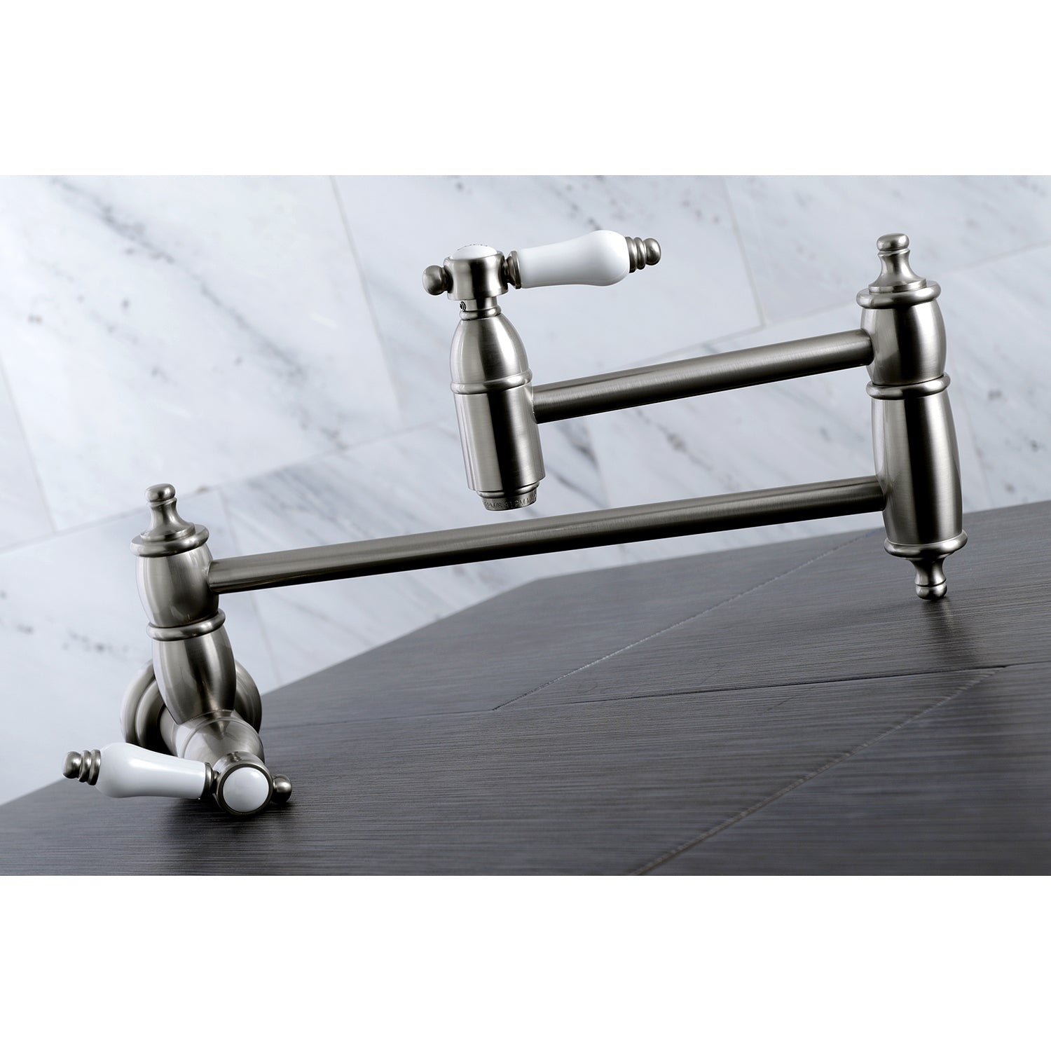 Kingston Brass KS3103BPL Bel-Air Wall Mount Pot Filler Faucet, Antique Brass with white porcelain levers and swing arms