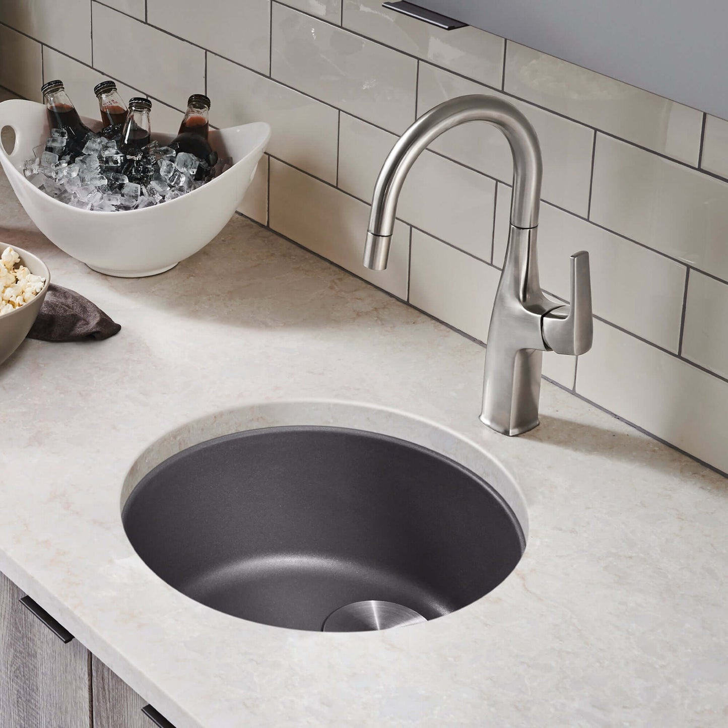 BLANCORONDO SILGRANIT 18" Dual Mount Bar Sink in a modern kitchen countertop setting with a sleek faucet.