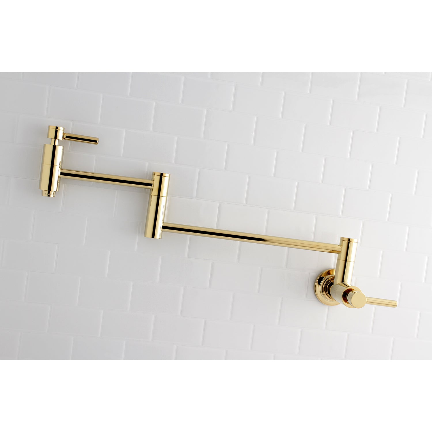 Kingston Brass KS8103DL Concord Wall Mount Pot Filler Faucet, Antique Brass with sleek cylindrical design.