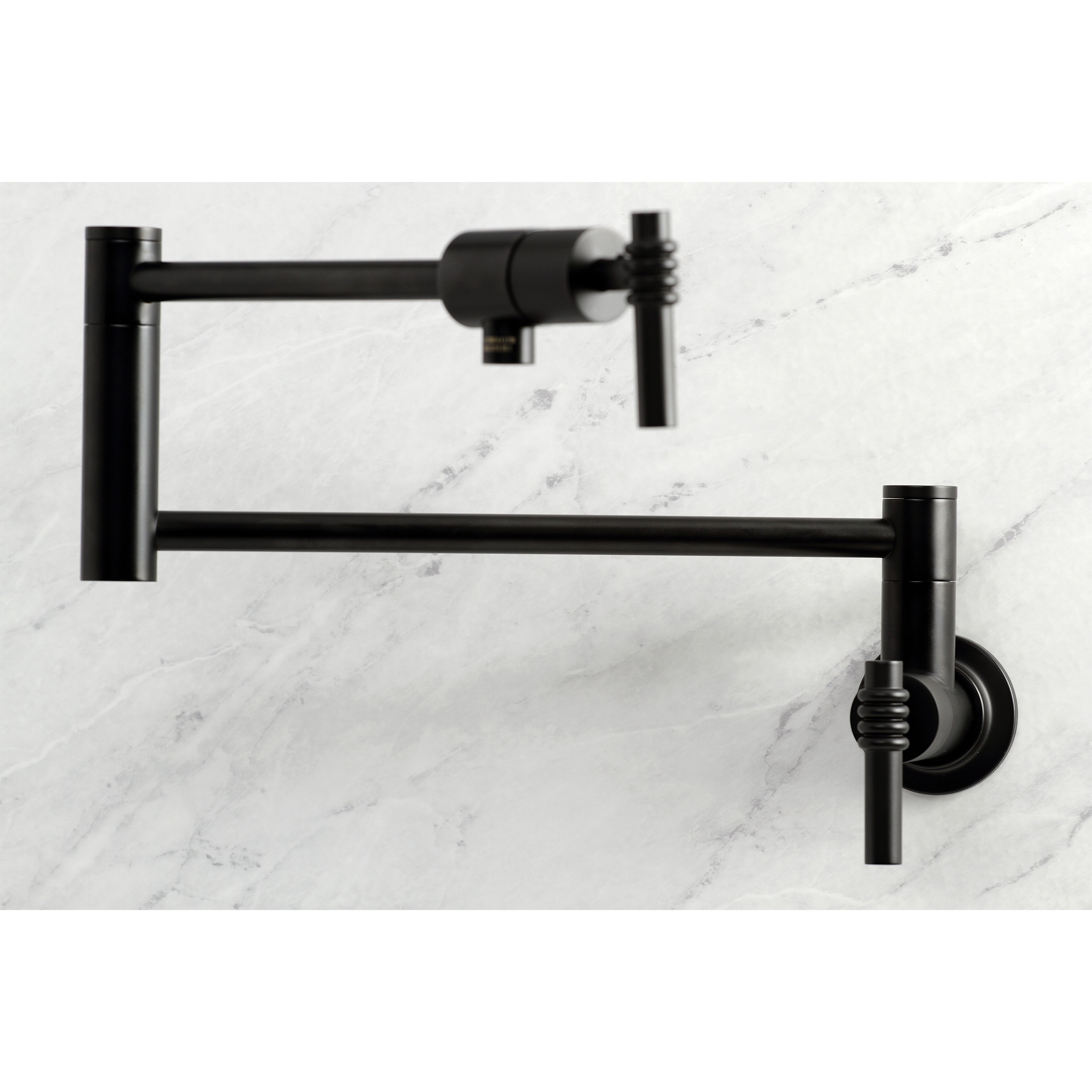 Kingston Brass KS4103ML Milano Wall Mount Pot Filler Faucet, Antique Brass close up on kitchen wall