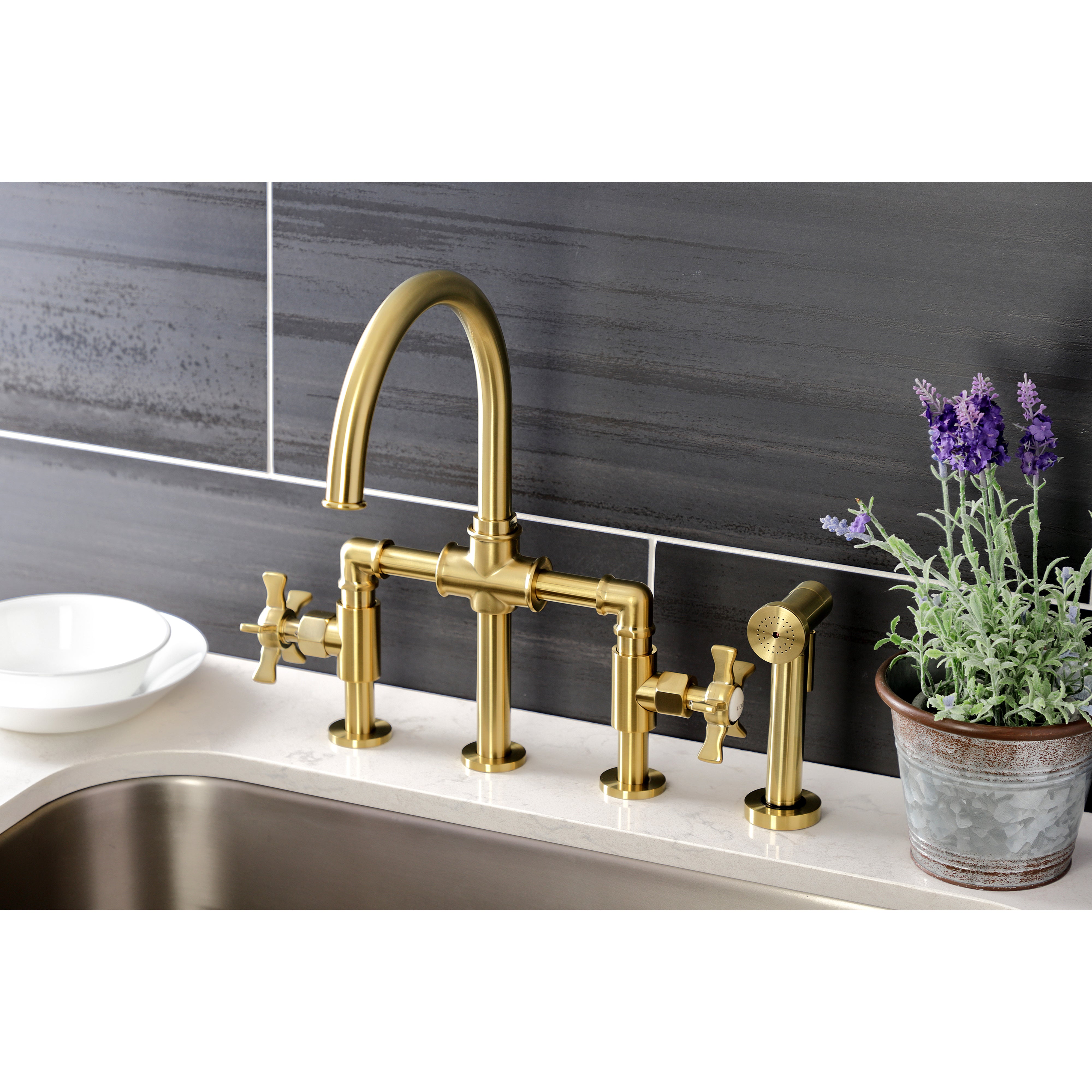 Kingston KS2333NX Hamilton Industrial Style Bridge Kitchen Faucet with Brass Sprayer, Antique Brass on modern kitchen countertop