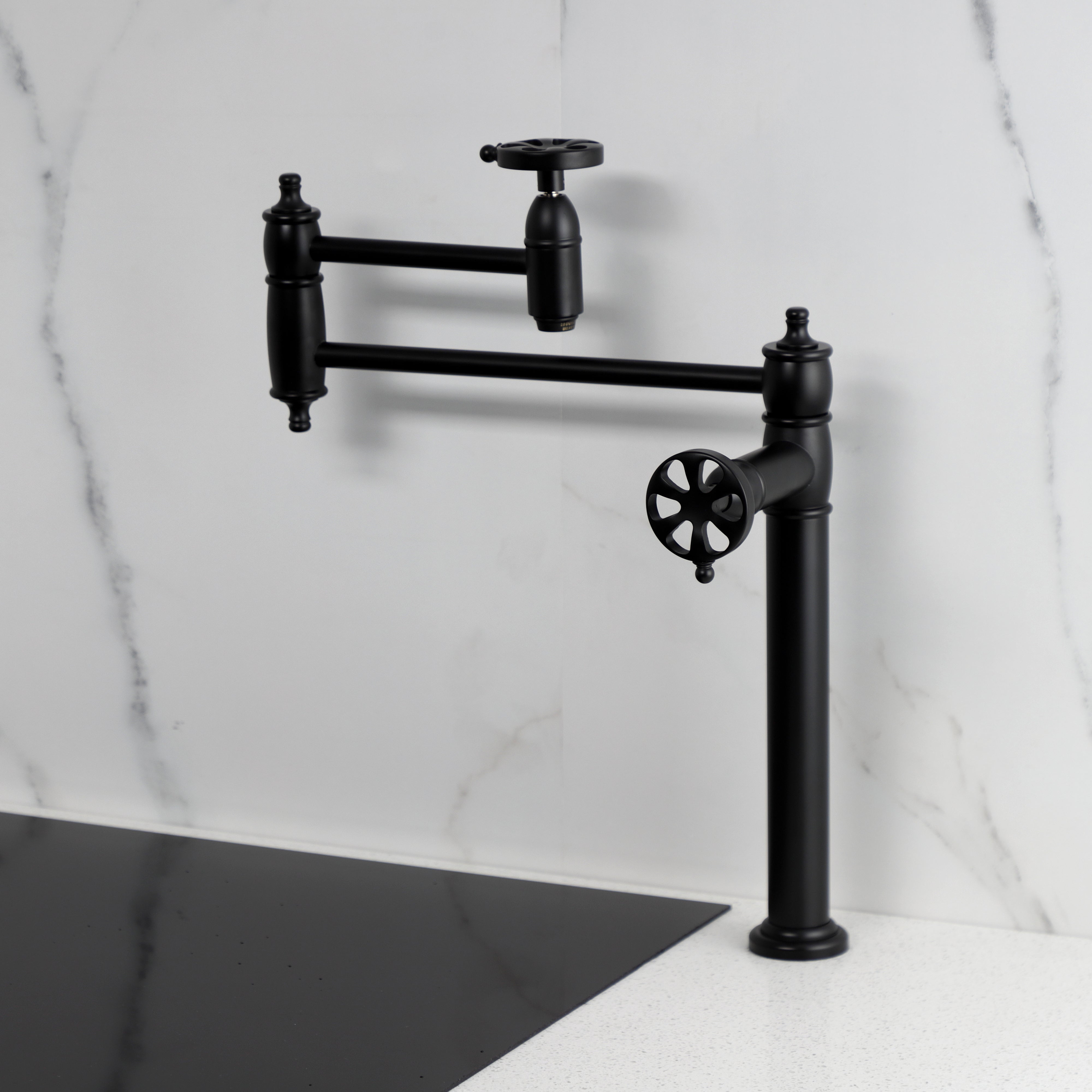 Kingston Brass KS3703RX Belknap Deck Mount Pot Filler Faucet, Antique Brass design with foldable swing arms.