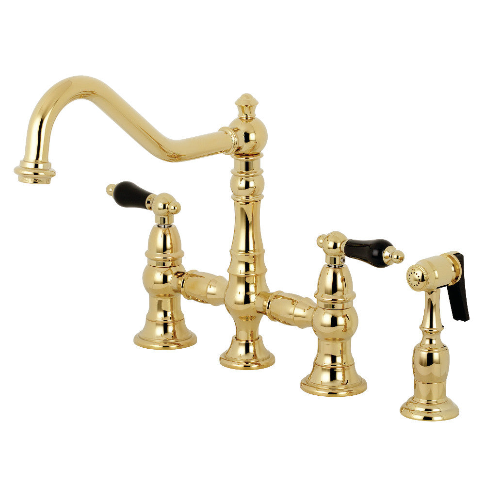 Kingston KS3277PKLBS Duchess Bridge Kitchen Faucet with Brass Sprayer, Brushed Brass features black porcelain handles and elegant design.