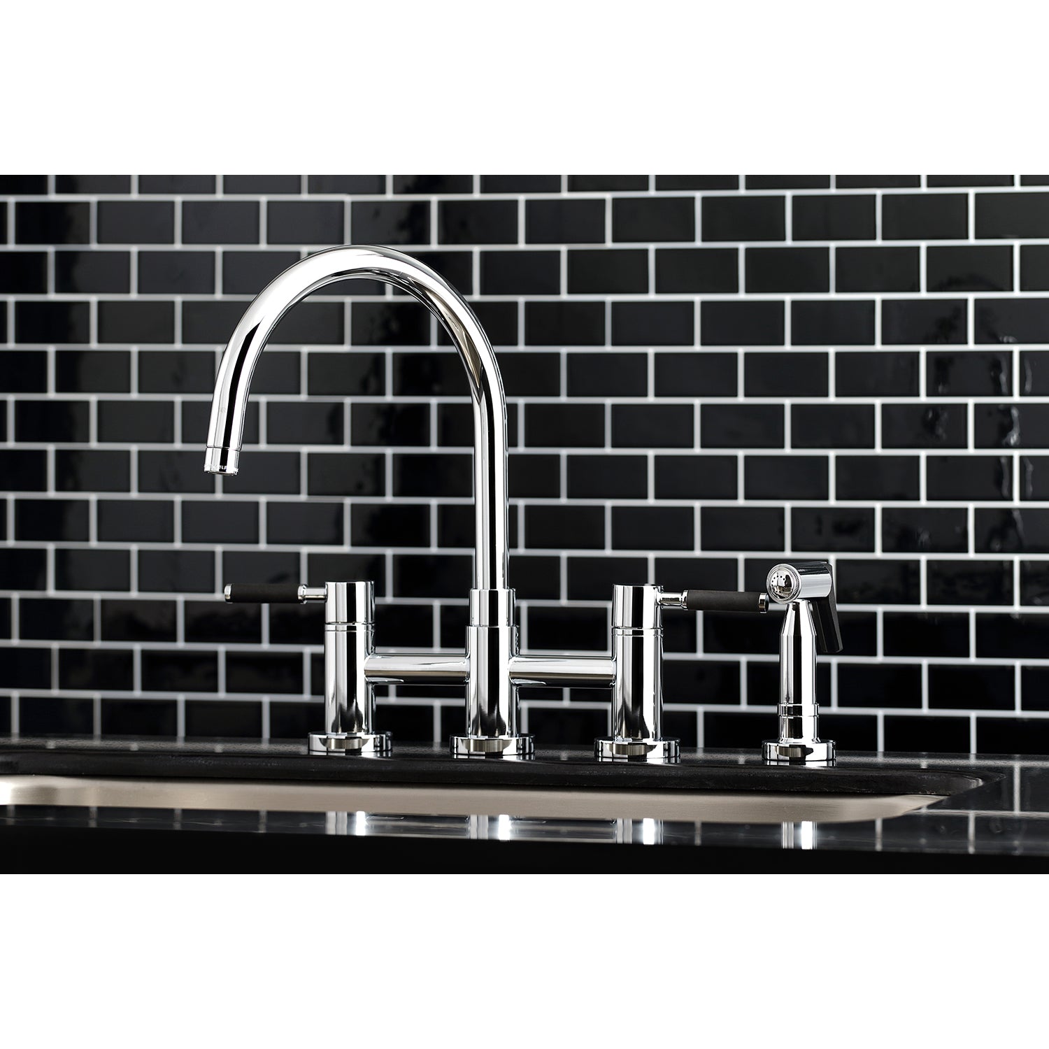 Kingston KS8278DKLBS Kaiser Bridge Kitchen Faucet with Brass Sprayer, Brushed Nickel on black tiled wall.