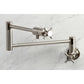 Kingston Brass KS4103DX Concord Wall Mount Pot Filler Faucet, Antique Brass close-up view with cylindrical design.