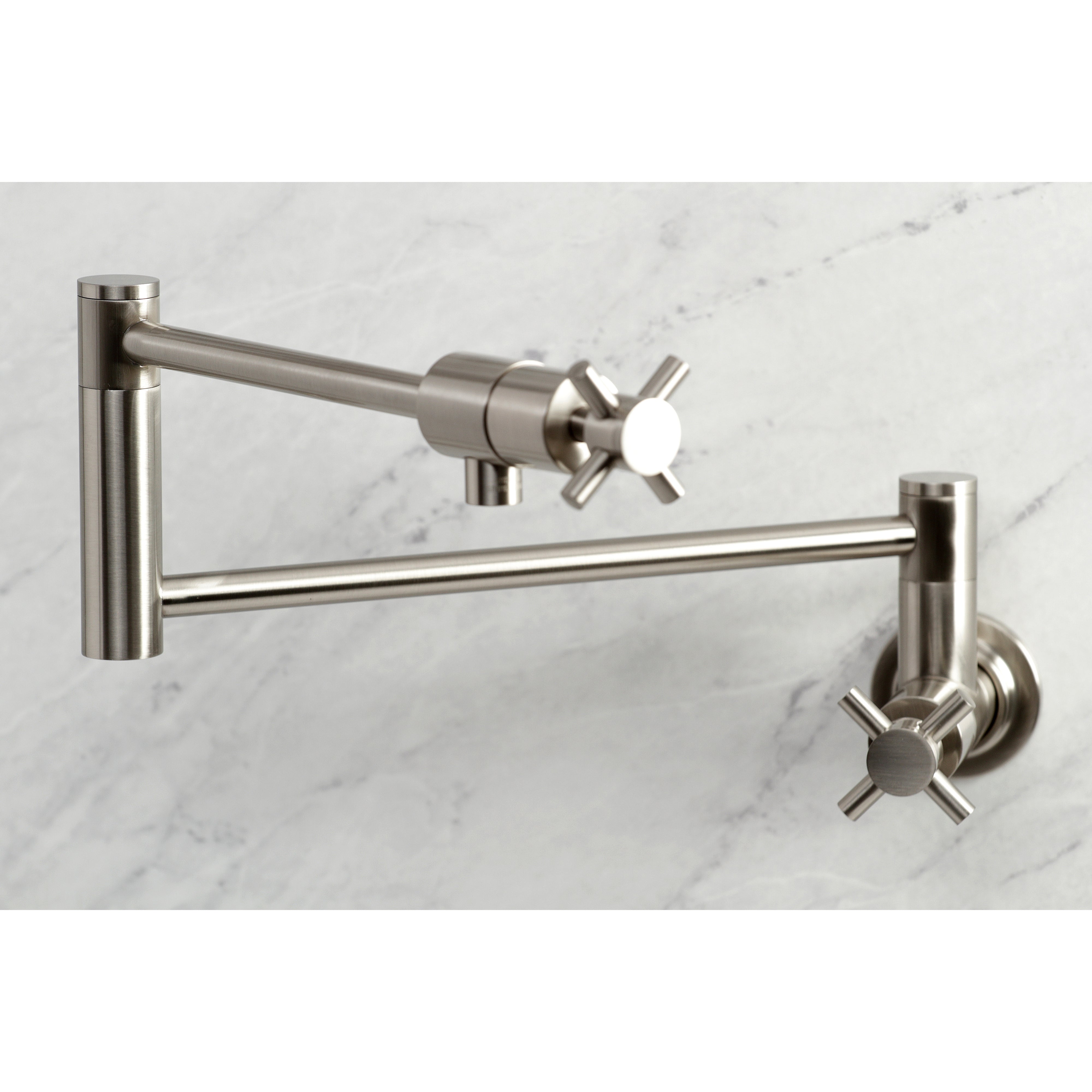 Kingston Brass KS4103DX Concord Wall Mount Pot Filler Faucet, Antique Brass close-up view with cylindrical design.