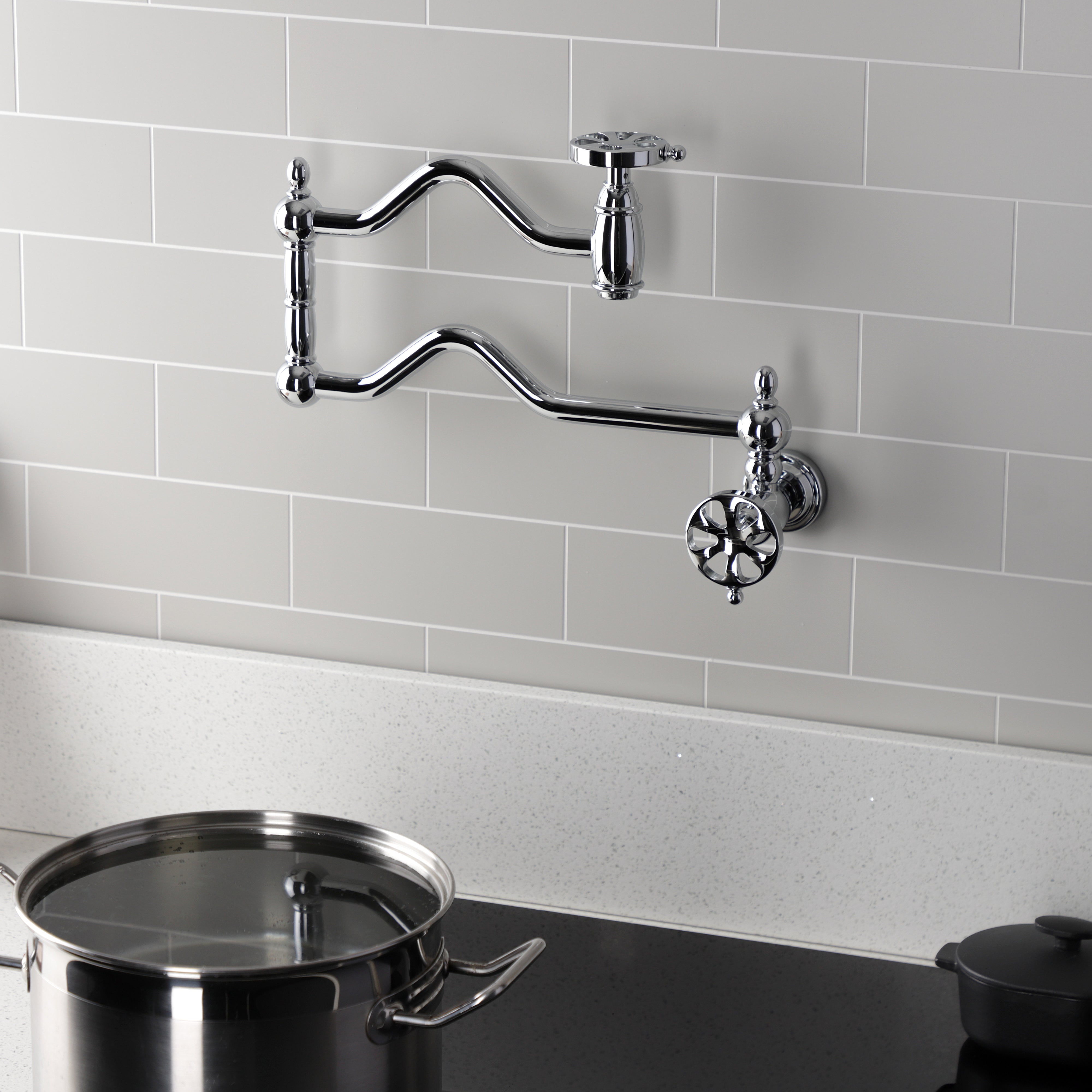 Kingston Brass KS2107RX Belknap Wall Mount Pot Filler Faucet, Brushed Brass in modern kitchen setting.
