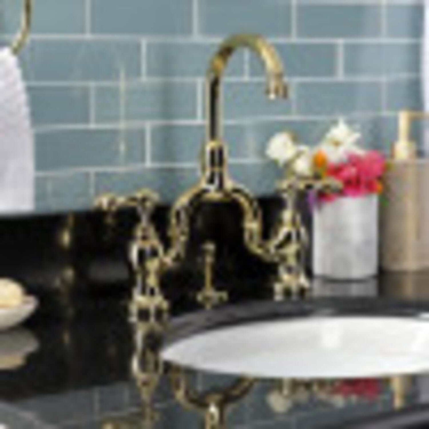 KINGSTON Brass English Country Bridge Bathroom Faucet with Brass Pop-Up - Polished Brass