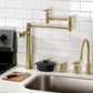 Kingston Brass KS8707DX Concord Deck Mount Pot Filler Faucet, Brushed Brass in modern kitchen setting
