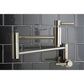 Kingston Brass KS8103DL Concord Wall Mount Pot Filler Faucet, Antique Brass against modern tile backsplash.