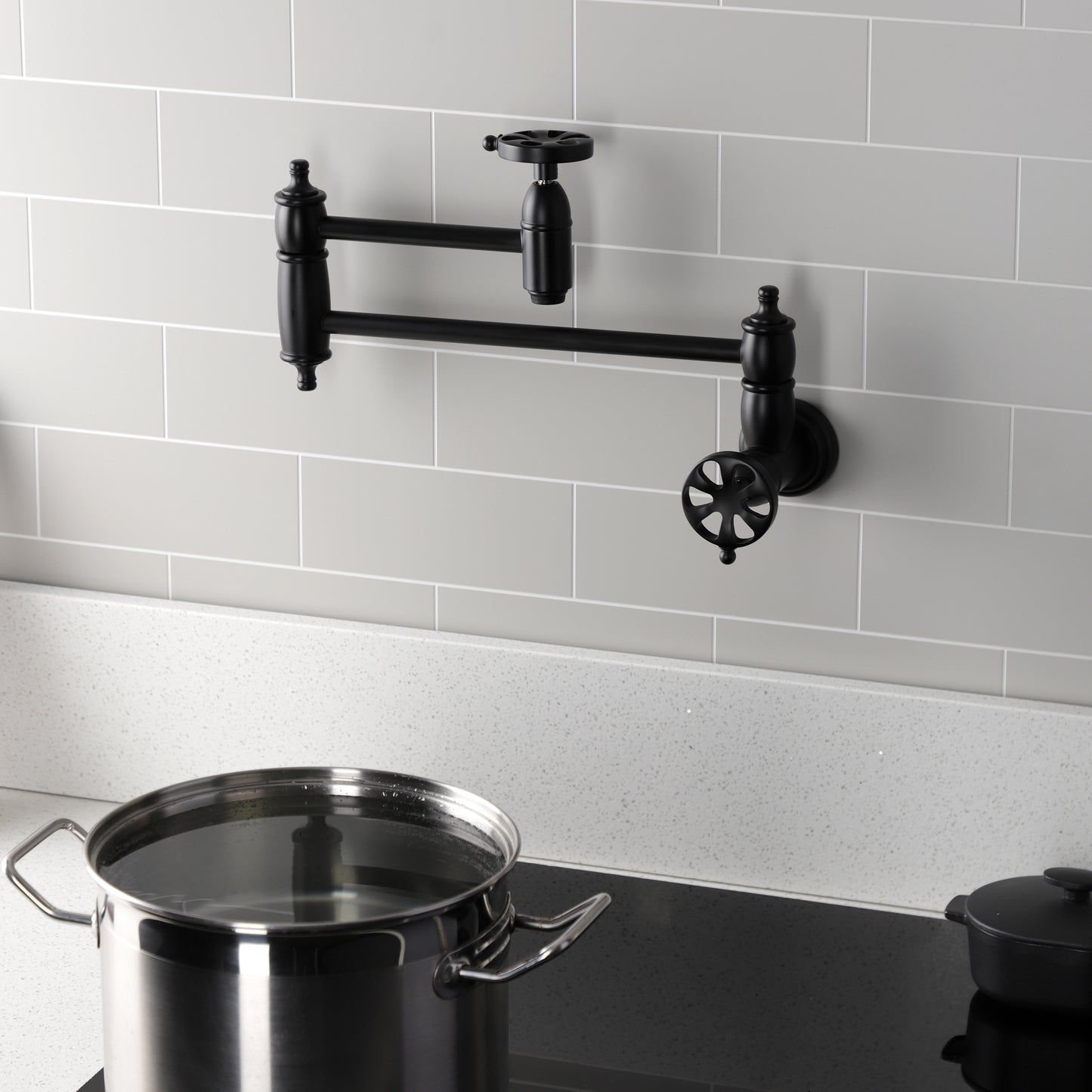 Kingston Brass KS3103RX Belknap Wall Mount Pot Filler Faucet, Antique Brass with stylish design and foldable swing arms.