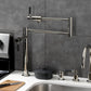 Kingston Brass KS4703DKL Kaiser Deck Mount Pot Filler Faucet, Antique Brass in a modern kitchen setting.