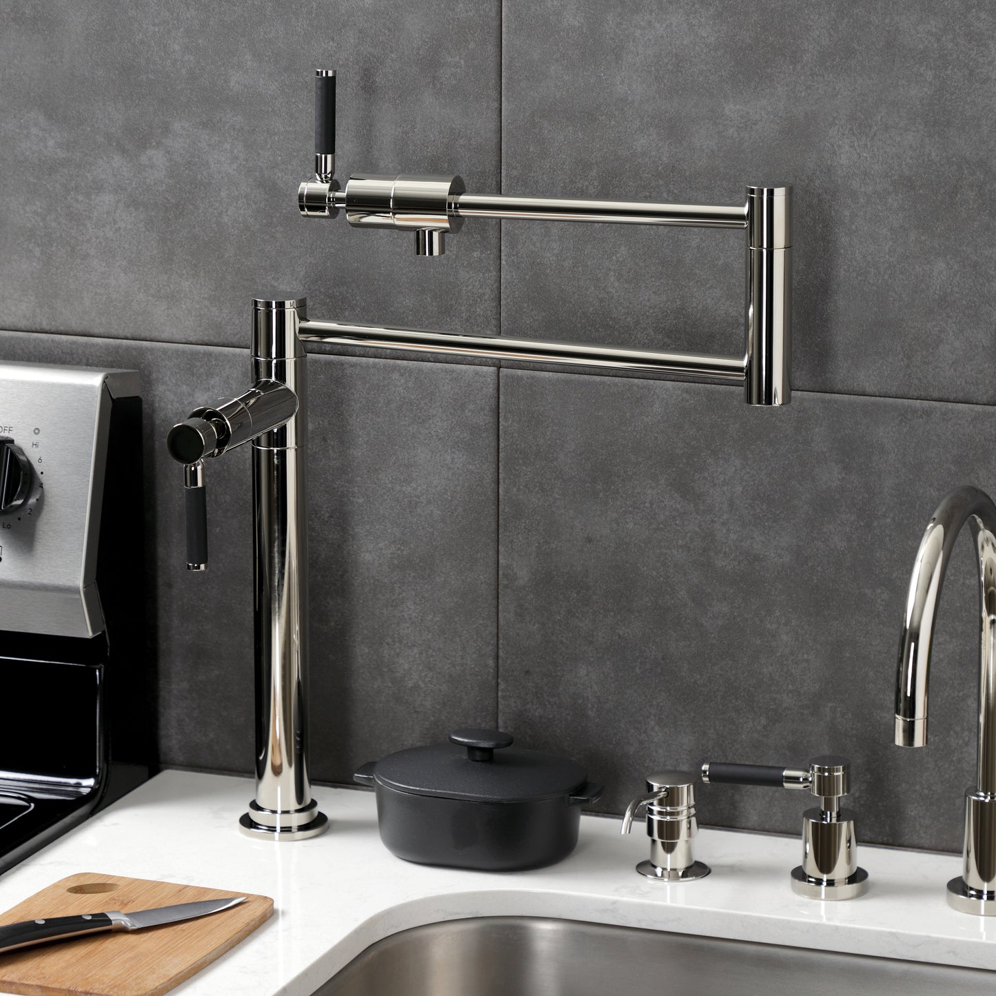 Kingston Brass KS4703DKL Kaiser Deck Mount Pot Filler Faucet, Antique Brass in a modern kitchen setting.