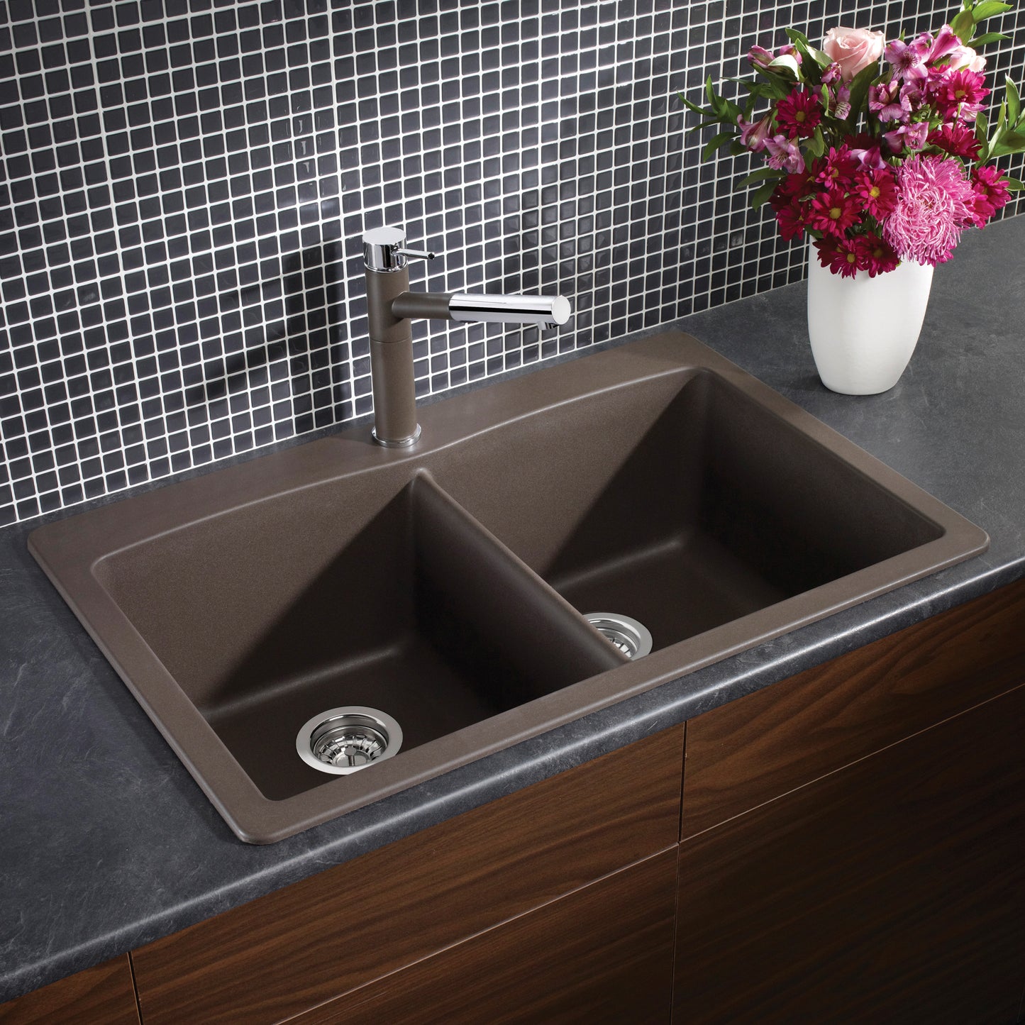 BLANCO Diamond SILGRANIT 33" 50/50 Double Bowl Dual Mount Kitchen Sink with modern faucet and floral decor.