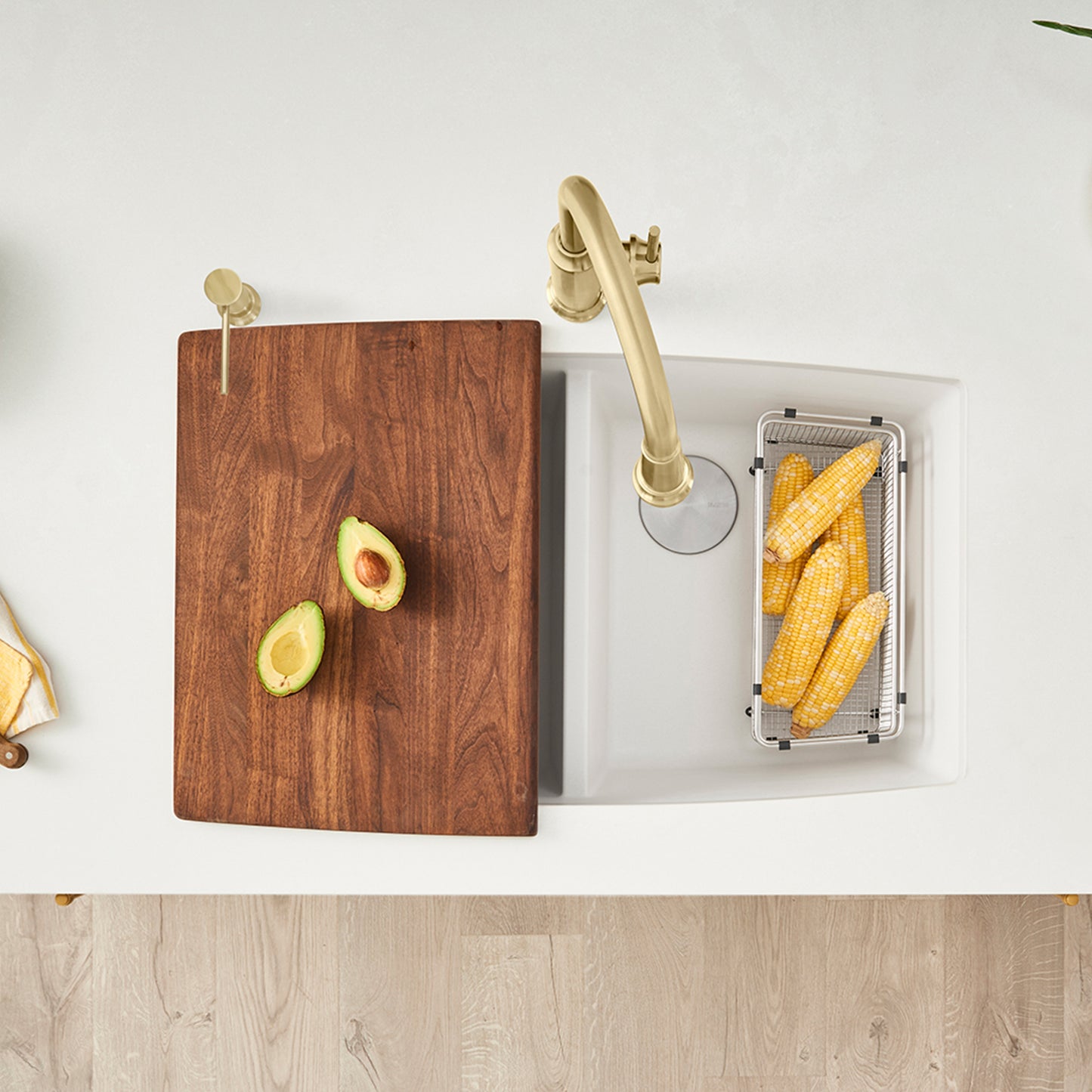 BLANCO Performa SILGRANIT 33" 50/50 Double Bowl Undermount Kitchen Sink with cutting board and fresh produce.