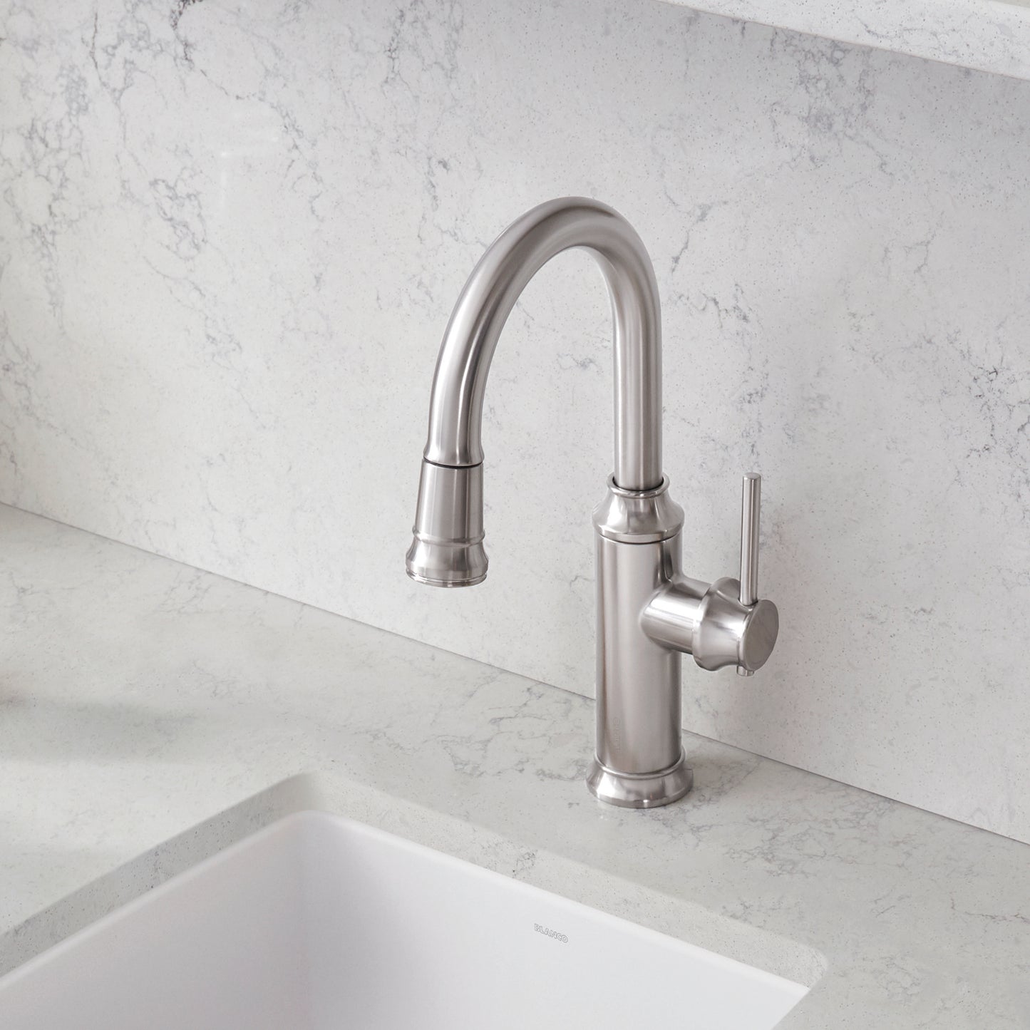 BLANCO Empressa Pull-Down Bar Faucet in stainless steel finish on a quartz countertop.