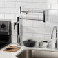Kingston Brass KS4703CKL Kaiser Deck Mount Pot Filler Faucet, Antique Brass in a modern kitchen setting.