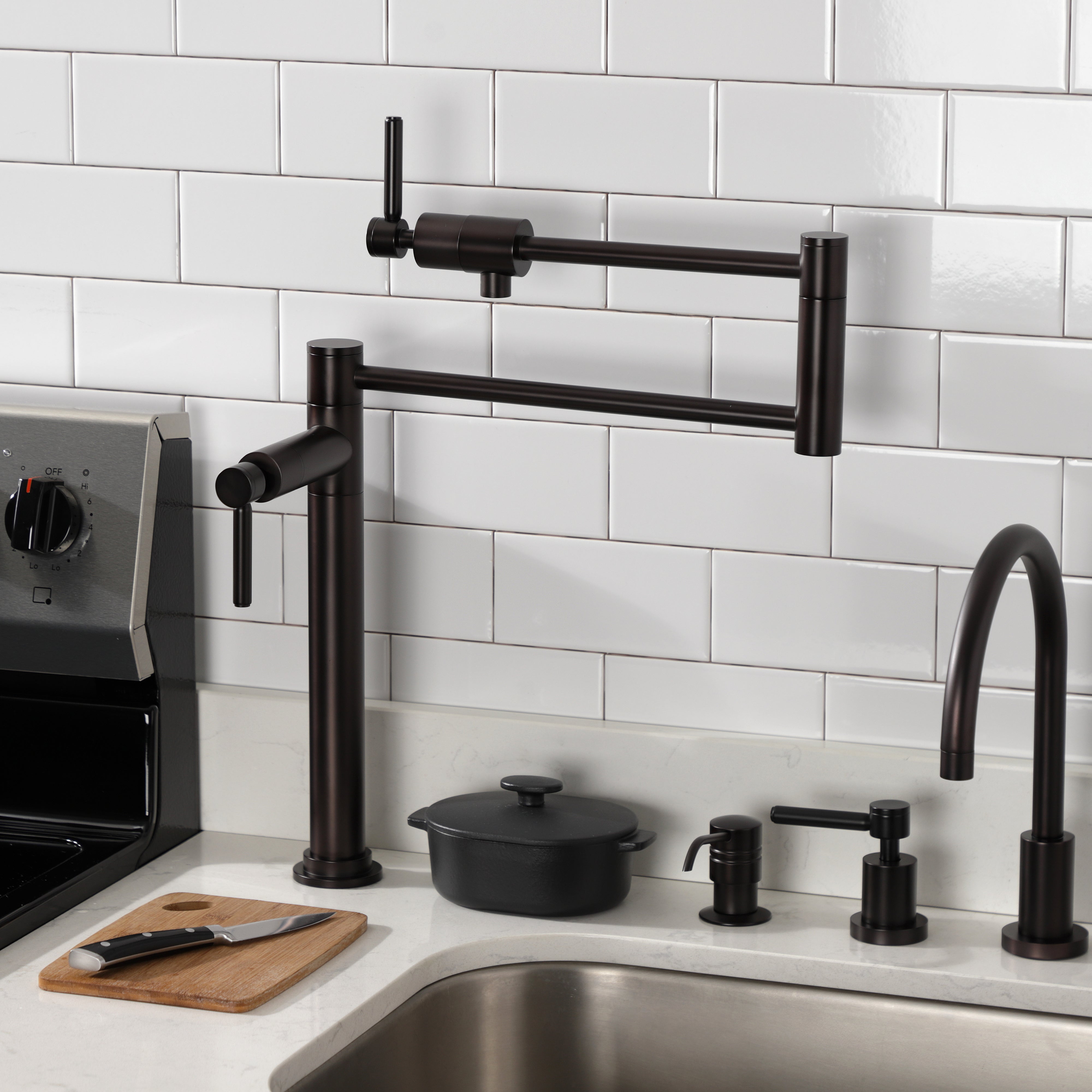 Kingston Brass KS4703DL Concord Deck Mount Pot Filler Faucet, Antique Brass in modern kitchen setting.