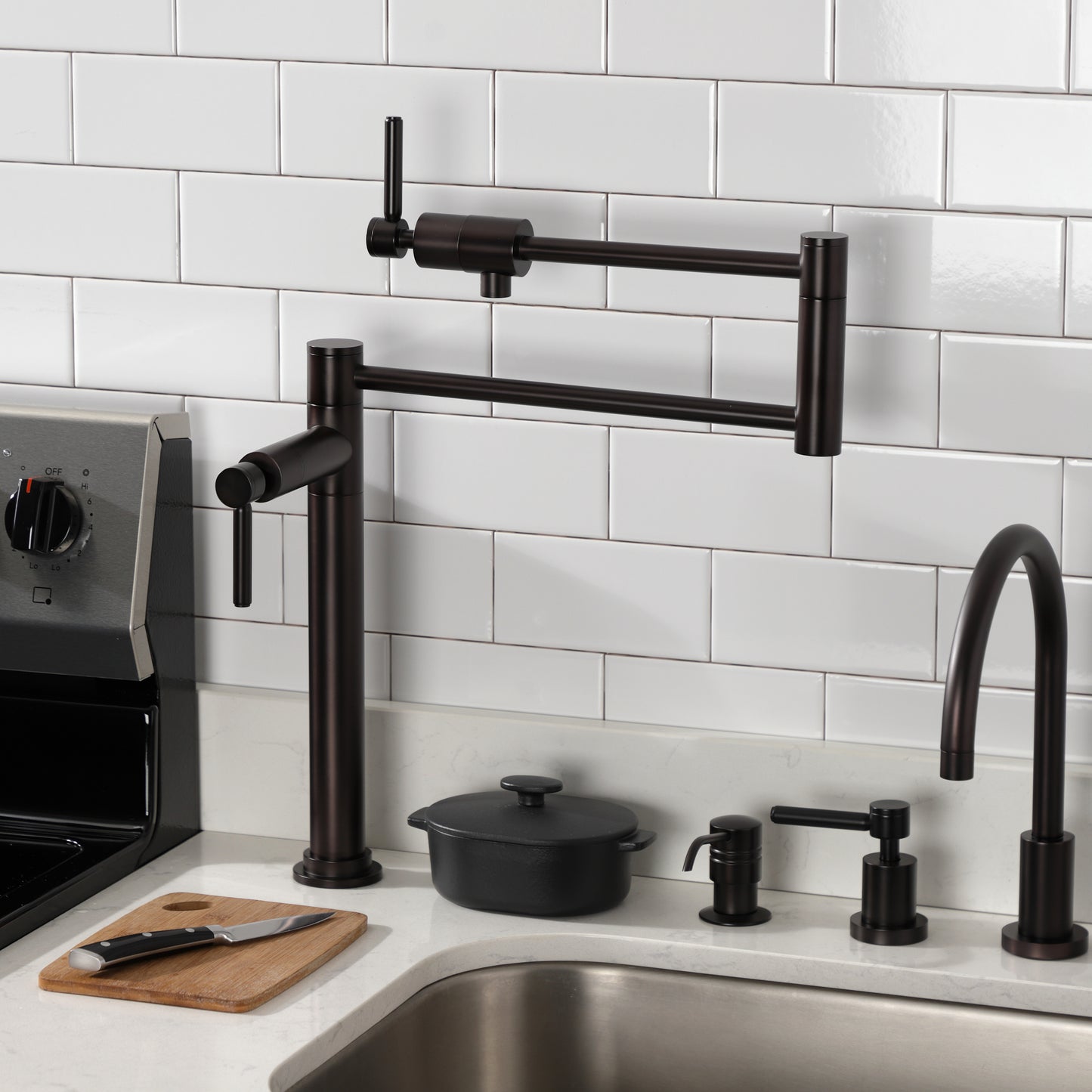 Kingston Brass KS4703DL Concord Deck Mount Pot Filler Faucet, Antique Brass in modern kitchen setting.
