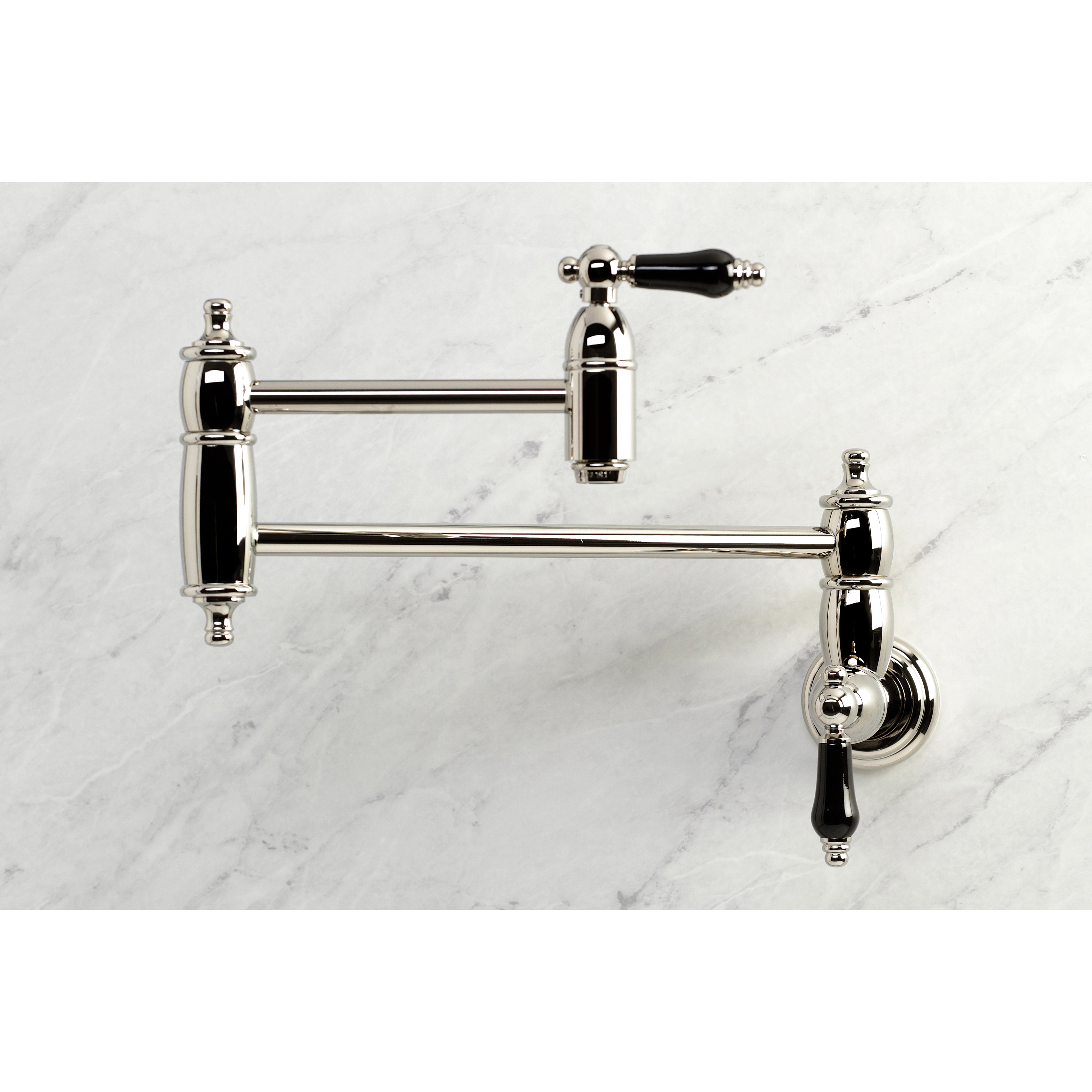 Kingston Brass KS3103PKL Duchess Wall Mount Pot Filler Faucet, Antique Brass shown in polished nickel finish.