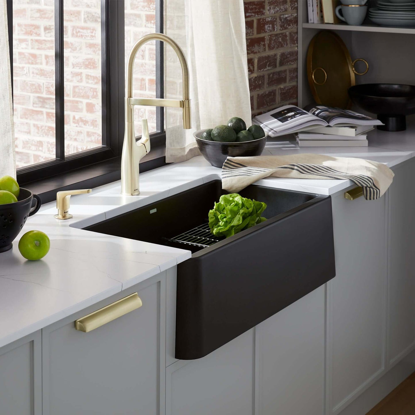 BLANCO Ikon SILGRANIT 33" Single Bowl Apron-Front Farmhouse Sink in a modern kitchen setting with fresh greens.