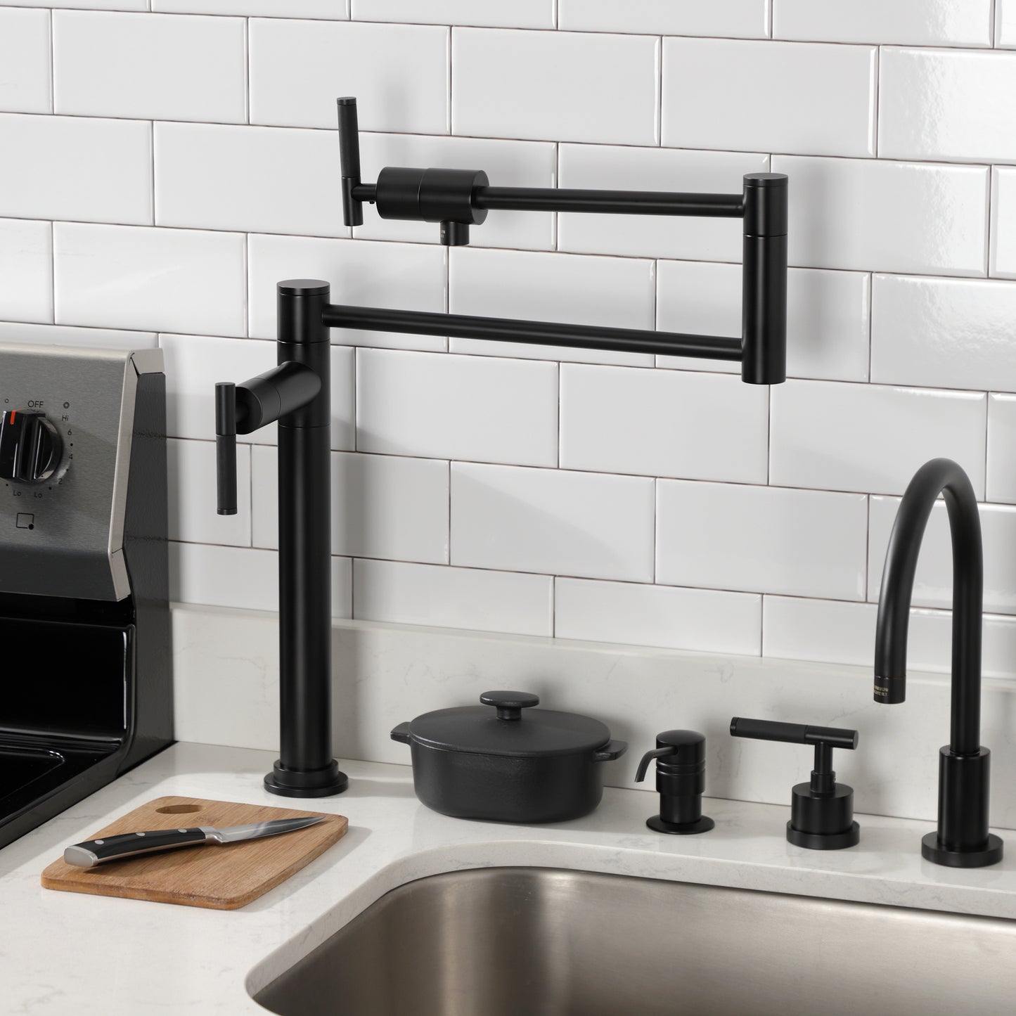 Kingston Brass KS4703CKL Kaiser Deck Mount Pot Filler Faucet, Antique Brass in a modern kitchen setting.