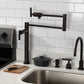 Kingston Brass KS4703CML Manhattan Deck Mount Pot Filler Faucet, Antique Brass installed in a contemporary kitchen.