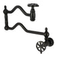 Kingston Brass KS2107RX Belknap Wall Mount Pot Filler Faucet, Brushed Brass with a matte black finish and swing arms.