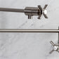 Kingston Brass KS4107ZX Millennium Wall Mount Pot Filler Faucet, Brushed Brass with cross handles and foldable swing arms.