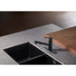 Gourmetier LS84DLAB Concord Single-Handle Pull-Out Kitchen Faucet, Antique Brass in a modern kitchen setting.