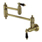 Kingston Brass KS3103PKL Duchess Wall Mount Pot Filler Faucet, Antique Brass with black porcelain handles