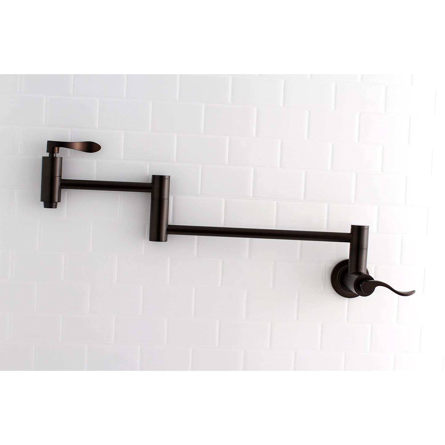 Kingston Brass KS8108DFL NuWave Wall Mount Pot Filler Faucet, Brushed Nickel on a white tiled wall.