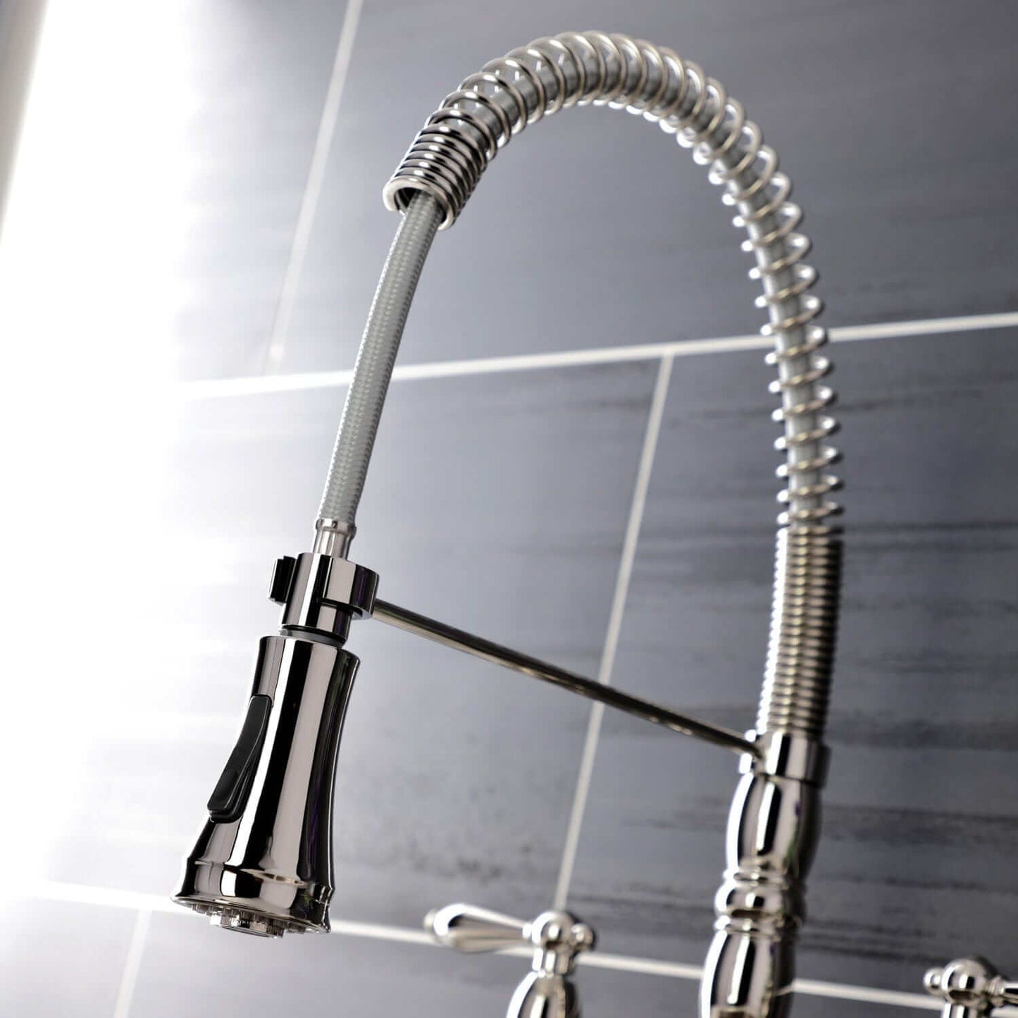 KINGSTON Brass Gourmetier Heritage Two-Handle Kitchen Faucet - Polished Nickel pull-down sprayer close-up