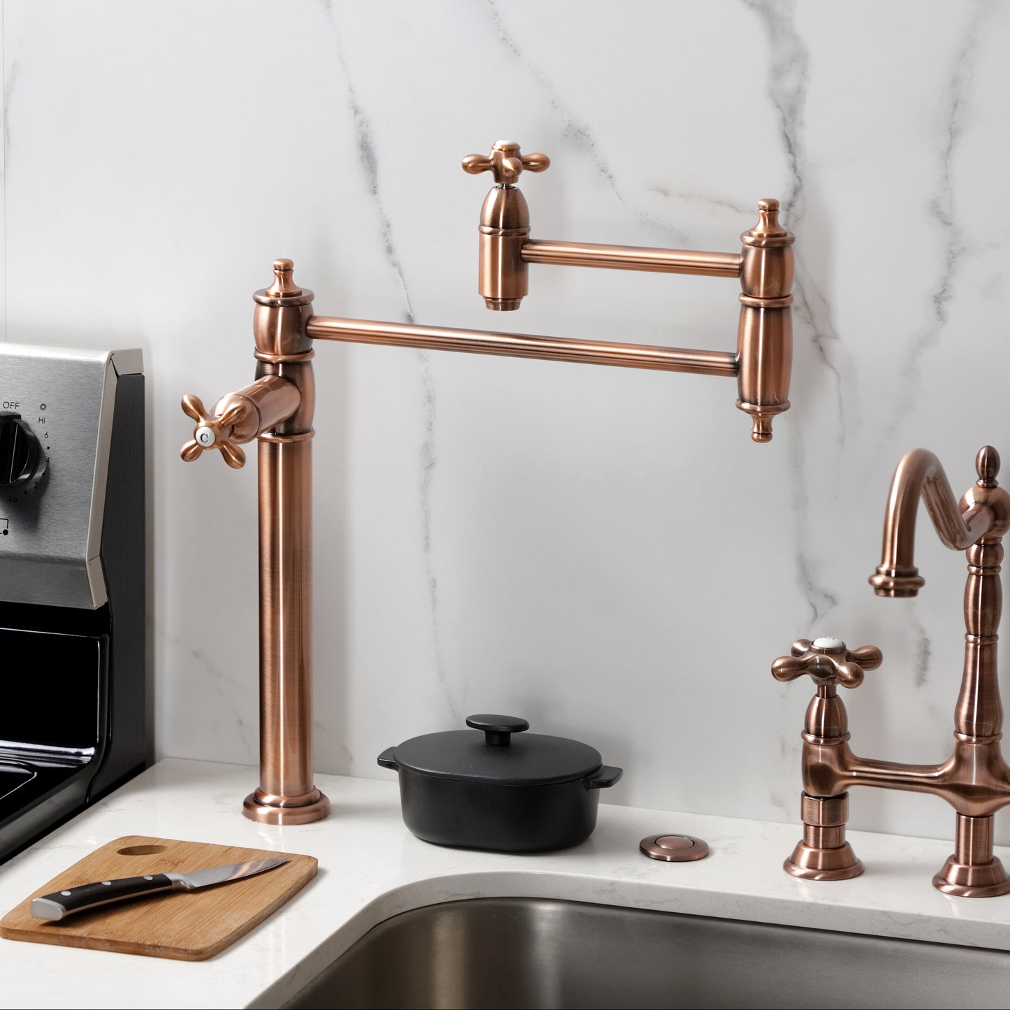 Kingston Brass KS3703AX Restoration Deck Mount Pot Filler Faucet, Antique Brass in a modern kitchen setting.