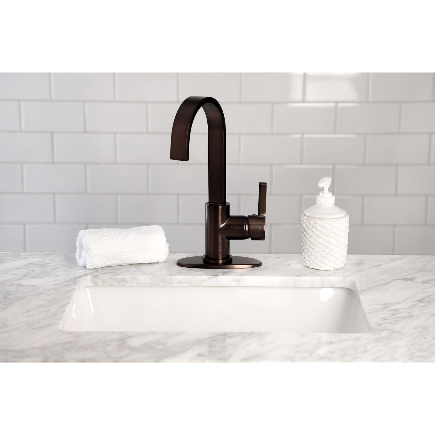 Kingston Brass LS8613CTL Continental Single-Handle Bar Faucet from right side view on a marble countertop.